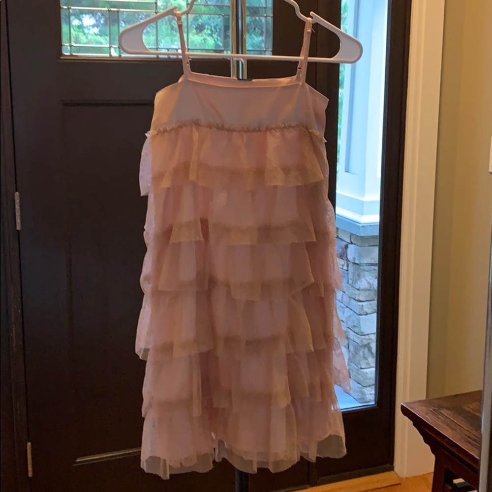 A girls sized 10-12 20’s style blush/sparkle